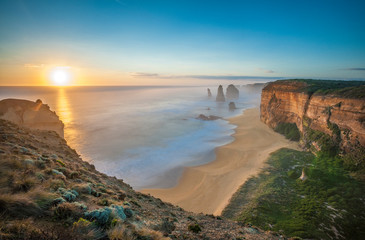 The 12 Apostles at sunset, near Port Campbell, Shipwreck Coast, Great Ocean Road, Victoria, Australia.