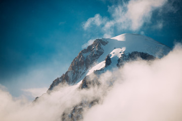 Georgia. Peak Of Mount Kazbek Covered With Snow. Kazbek Is A Str