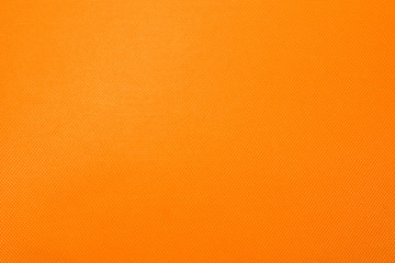 Orange diamond-shaped plastic texture.