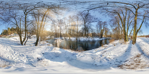 full seamless spherical panorama 360  degrees angle view near narrow fast river in a winter sunny evening. 360 panorama in equirectangular projection. VR AR virtual reality content