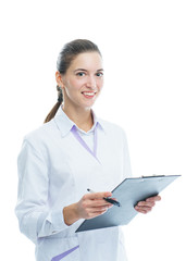 Young woman medic doctor practitioner with a folder in white uniform looking with a smile. 