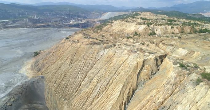 Aerial view of a mining waste disposal and the ecological damage
