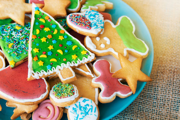 Plate with tasty holiday Gingerbread Cookies - Happy New Year card 