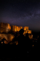 Fototapeta premium Silhouettes of tourists, visitors and locals at the Acropolis