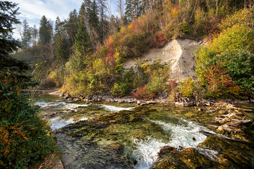 River Grundlseer Traun on a sunny autumn day, as viewed from the alpine town of Bad Aussee. Austria, Styria.