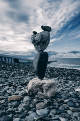 Balance stones against the sea