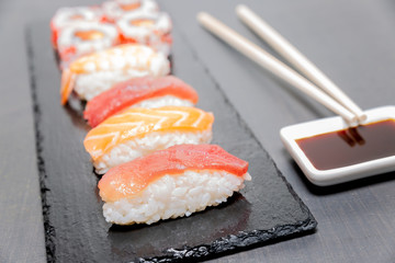 Sushi, a typical Japanese food prepared with a base of rice and various raw fish such as tuna, salmon, shrimp and sea bream. To which is added, according to the variants. 