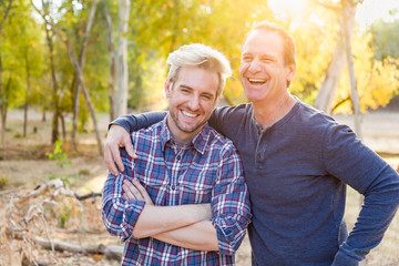 Happy Caucasian Father and Son Portrait Outdoors