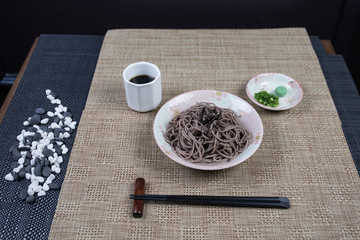 Close up view of plate with japanese food inside. Japan traditional food on wooden table. Selective focus