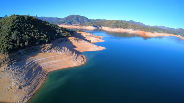 Shasta Lake Water Reservoir Aerial View Showing Low Water Levels During Drought