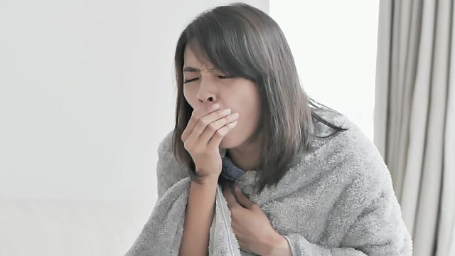 woman sick and cough