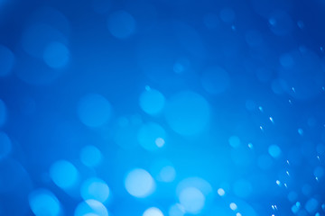 Abstract blue bokeh background.