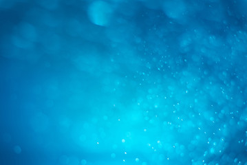 Abstract blue bokeh background.