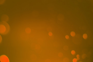 Abstract orange bokeh background.
