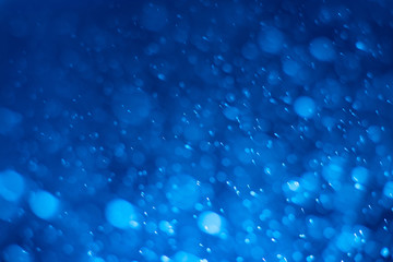 Abstract blue bokeh background.