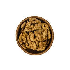 Split walnuts in wooden Cup isolated on white background. The view from the top.