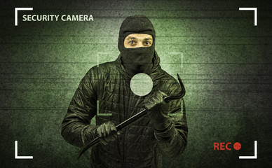 Caught burglar by house camera in action.