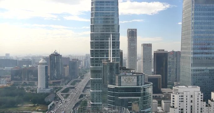 4k,Aerial View of heavy traffic through BeiJing central business district that is located in the Chaoyang district,It's the main hub for financial and business activities in China's capital city.