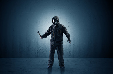 Bad agent in a dark room with arms on his hand and gas mask
