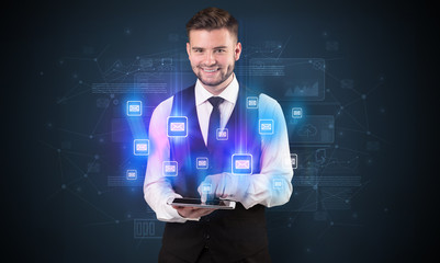 Mailing concept on a tablet with spectacled businessman on the background
