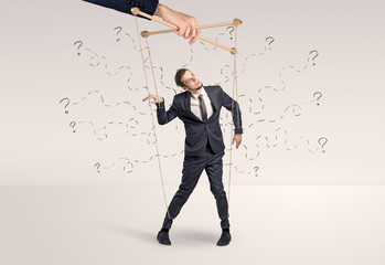 Marionette businessman with doodle lines and arrows around him
