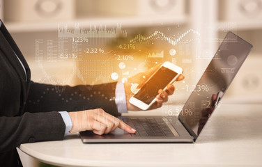 Business woman in homey environment using laptop with financial report concept
