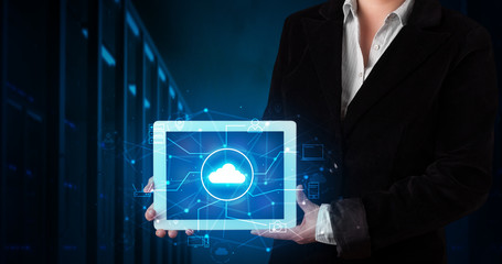 Formal hand in server room with virtual workspace concept
