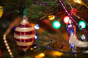 Beautiful original toy whirligig on Christmas tree close-up