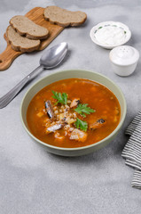 Traditional tomato fish soup