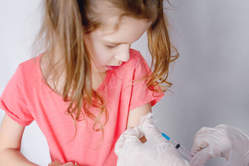 Vaccination of children. Injection. Vaccinations. Parents ' choice in vaccinating their children. Selective focus.