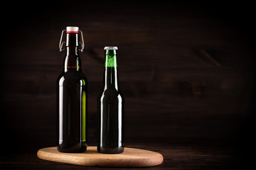 Fototapeta na wymiar a glass of beer on wooden background