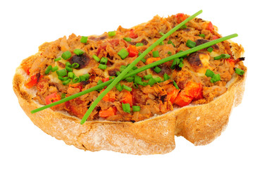 Grilled tuna fish and cheese on toast with chives isolated on a white background