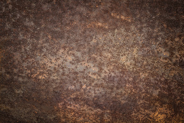 Dark worn rusty metal texture background. Vintage effect.