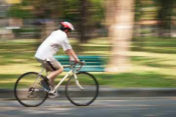 Naklejka premium Motion blur of a bike rider