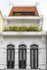 Phuket old town : Sino-Portuguese Architecture buildings. This architectural style is European mixed with Chinese modern, Thailand. Ancient window.