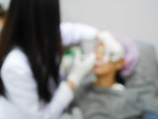 The injection of facial in the clinic, blurred images