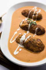 Malai Kofta Curry is a Mughlai special recipe served in a bowl. Selective focus