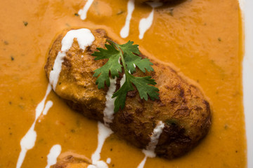 Malai Kofta Curry is a Mughlai special recipe served in a bowl. Selective focus