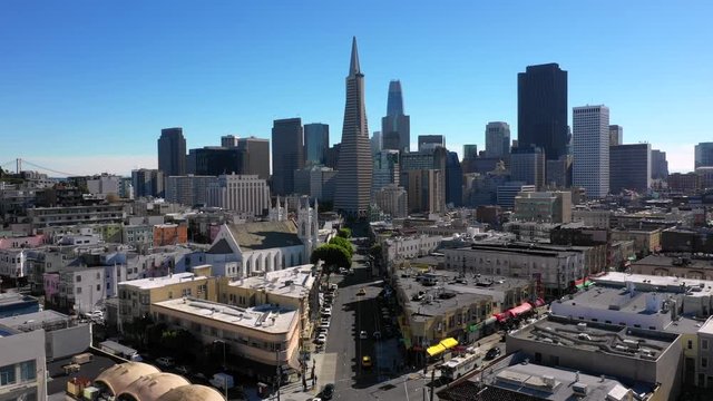 4K Aerial clip approaching downtown san francisco and the transamerica pyramid during a blue sky day