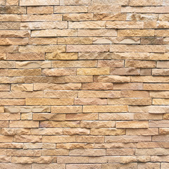 Brown brick wall as a background or texture