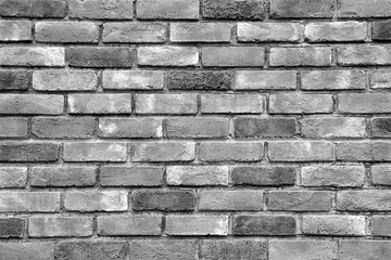 Photo sur Aluminium Mur de briques Gray brick wall as a background or texture