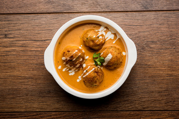 Malai Kofta Curry is a Mughlai special recipe served in a bowl. Selective focus