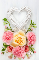  Festive floral composition with heart from wooden branches