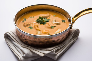 Cashew Curry / Indian kaju masala served in a bowl or pan. selective focus