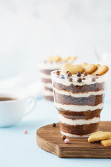 Individual desserts in glasses, chocolate trifle with hearts.
