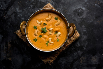 Cashew Curry / Indian kaju masala served in a bowl or pan. selective focus