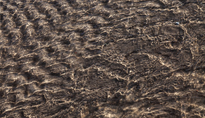 Priel im Watt mit Rippelmarken