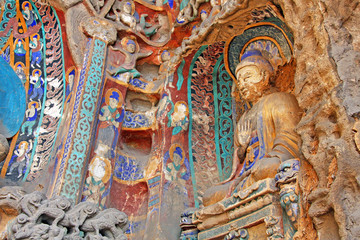 Buddha statues of Yungang Grottoes : The World cultural heritage site, Famous "Buddhist Caves Art Treasure Houses" in Datong, Shanxi Province, China. World heritage site. Selective focus.