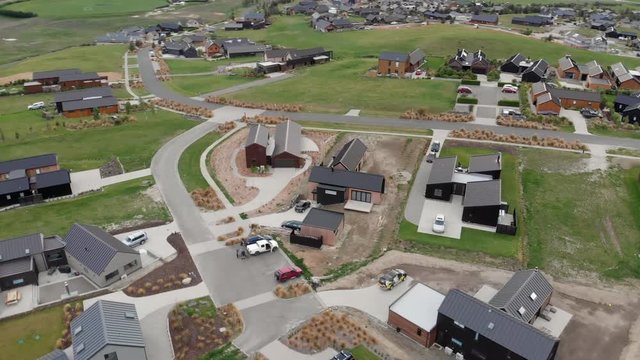 New houses and roads arise in this new residential area in Queenstown, New Zealand.