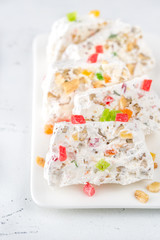 White nougat slices on white plate